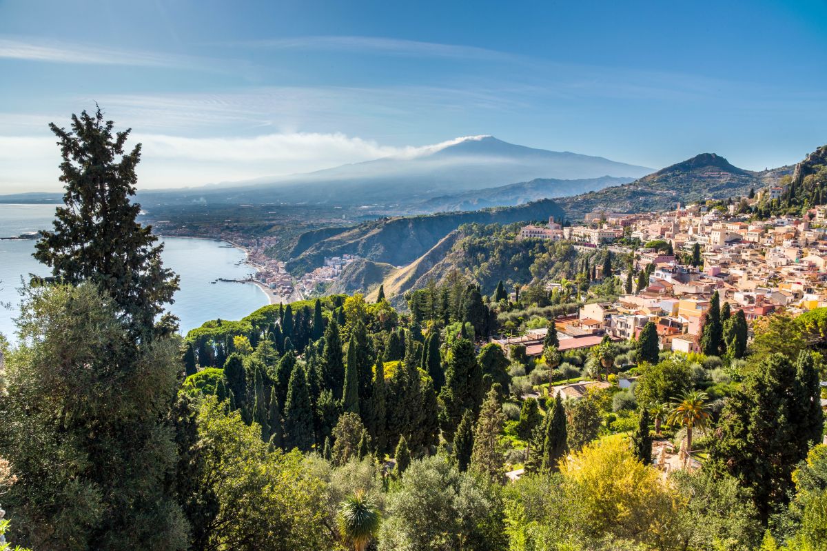 The bay of Giardini-Naxos, Taormina and the Etna viewed from the top of the Greek Theater, Taormina, Sicily, Italy - res