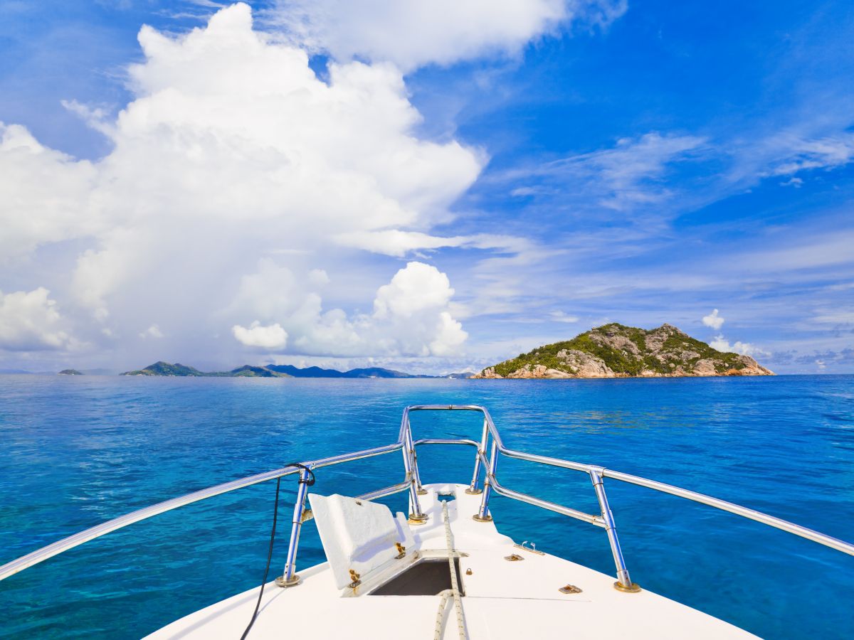 Tropical island and boat - nature background